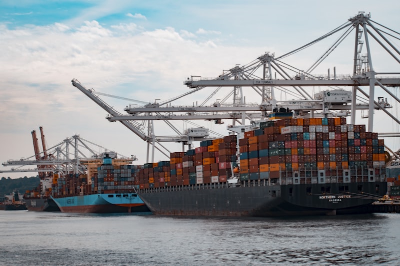 Global trade logistics — cargo ship, aircraft and port